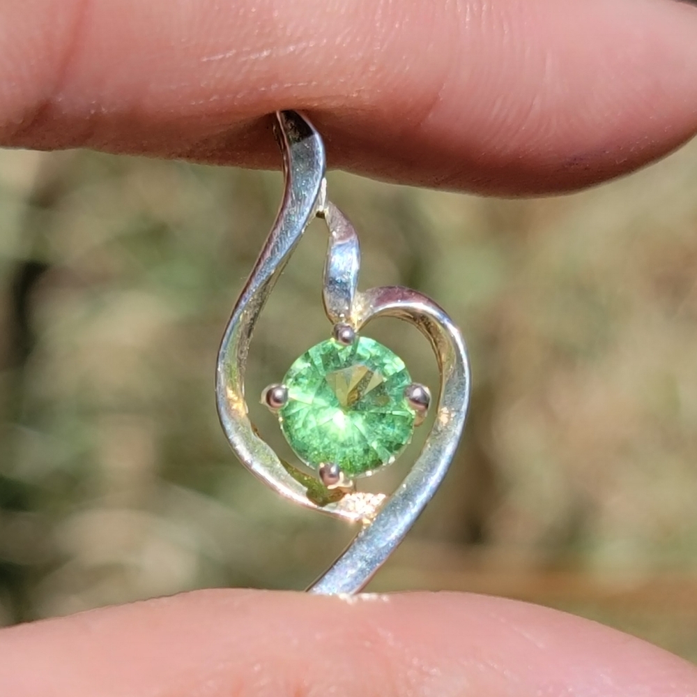 Elegant and stunning 925 sterling silver green topaz double swirl pendant